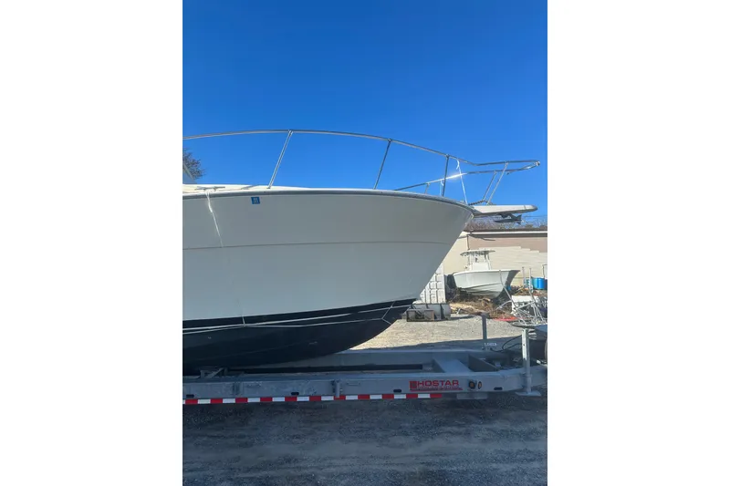 Slide: The Image of 1988 Viking 35 Convertible boat with Petzold's Marine Center label and serial number KY35143G788. - 9