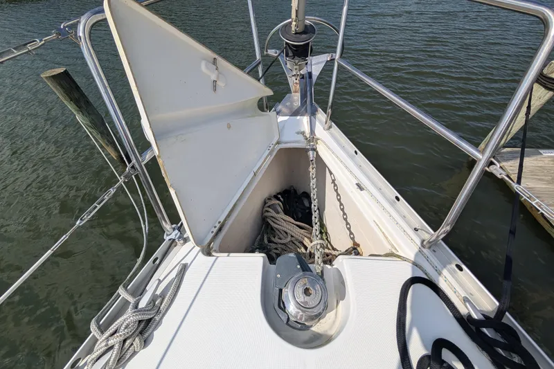 Slide: The Image of Bow of 2006 Beneteau Oceanis Clipper 373 with anchor chain and ropes. - 5