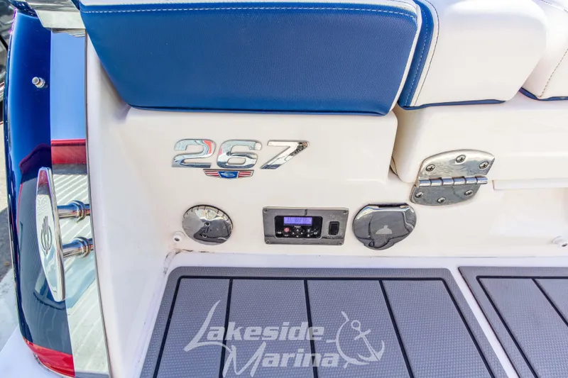 Slide: The Image of 2021 Chaparral 267 SSX boat stern with logo and Lakeside Marina branding. - 13