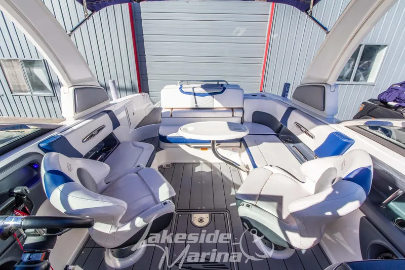 Slide: The Image of 2021 Chaparral 267 SSX boat interior with luxurious seating and modern design. - 30