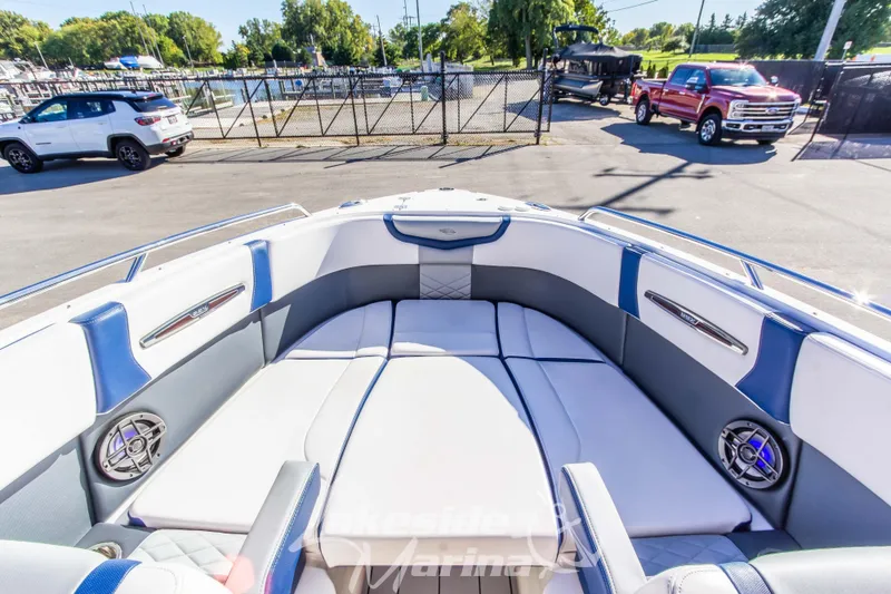 Slide: The Image of 2021 Chaparral 267 SSX boat interior with spacious seating and modern design. - 34