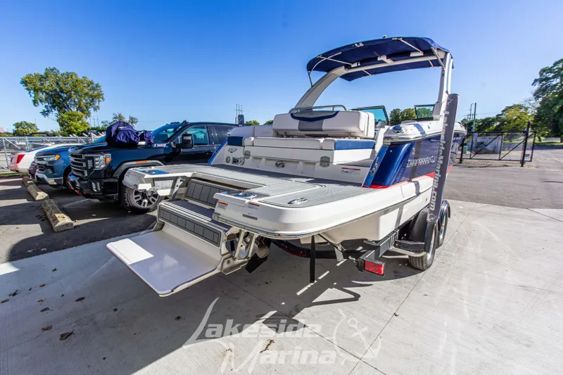 Slide: The Image of 2021 Chaparral 267 SSX boat on trailer at Lakeside Marina parking lot. - 6
