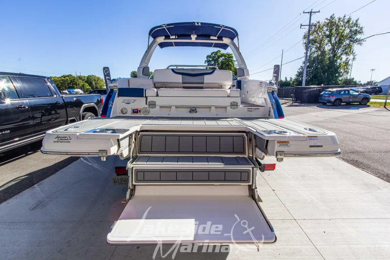 Slide: The Image of 2021 Chaparral 267 SSX boat with extended swim platform at Lakeside Marina. - 7