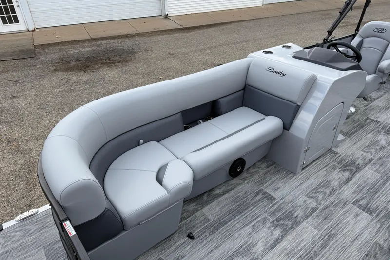 Slide: The Image of 2026 Bentley Pontoons Legacy 220 Cruise XL with sleek gray seating and modern design. - 10