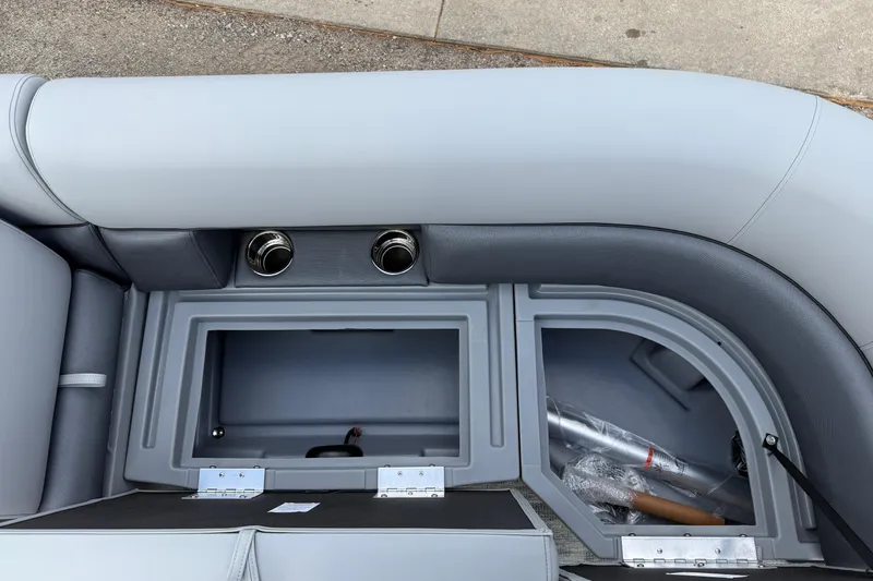 Slide: The Image of 2026 Bentley Pontoons Legacy 220 Cruise XL storage compartments and seating detail. - 13