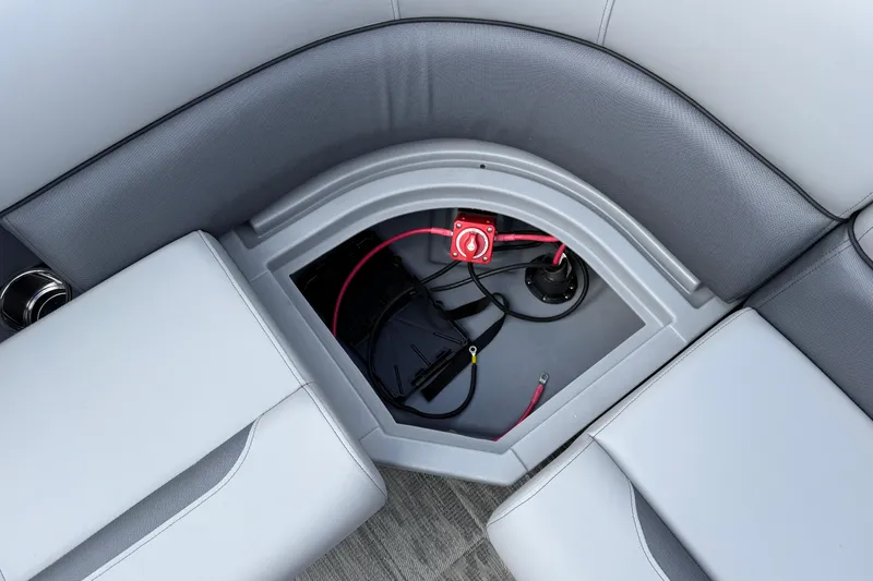 Slide: The Image of 2026 Bentley Pontoons Legacy 220 Cruise XL seating with storage compartment and wiring. - 22