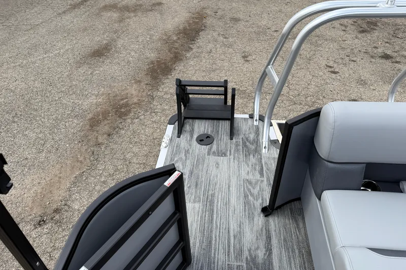 Slide: The Image of 2026 Bentley Pontoons Legacy 220 Cruise XL interior with gray seating and flooring. - 23