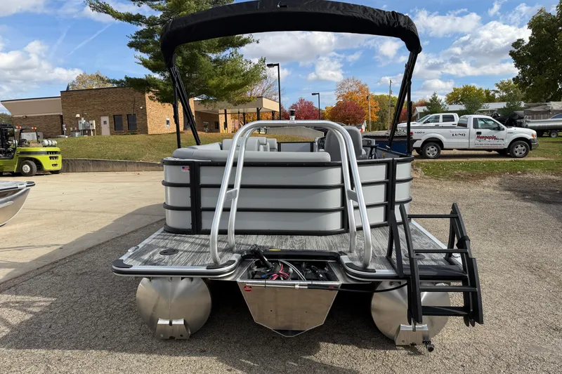Slide: The Image of 2026 Bentley Pontoons Legacy 220 Cruise XL, rear view, parked outdoors. - 5
