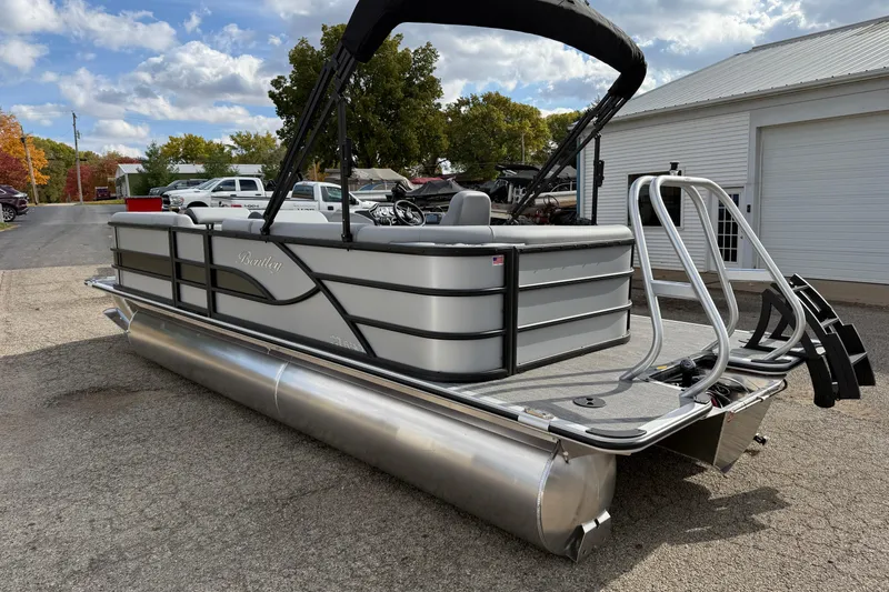 Slide: The Image of 2026 Bentley Pontoons Legacy 220 Cruise XL pontoon boat with sleek design and modern features. - 6