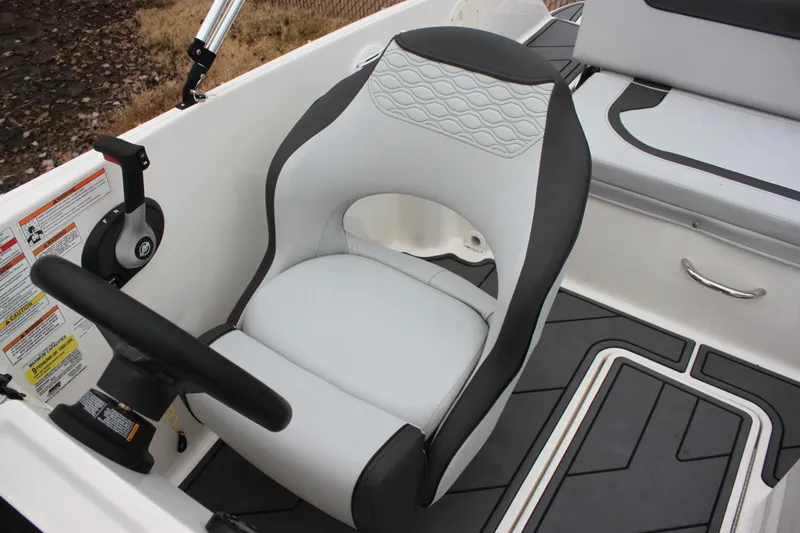 Slide: The Image of 2023 Bayliner Element M19 boat with powerful outboard motor on trailer. - 11