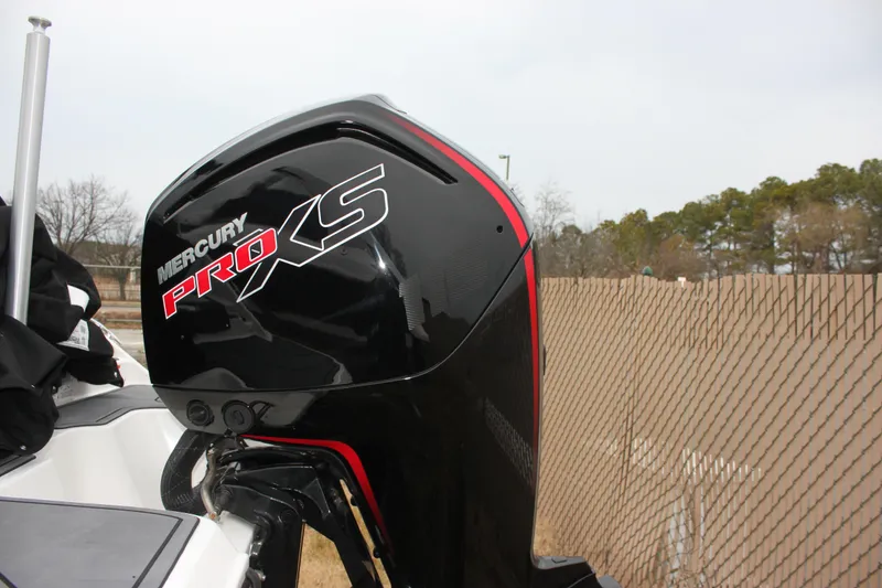 Slide: The Image of 2023 Bayliner Element M19 boat interior with cushioned seating and sleek design. - 8