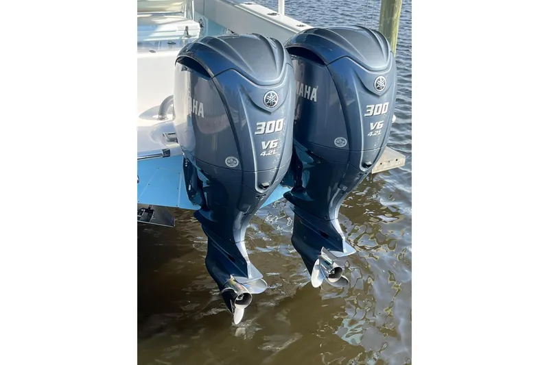 Slide: The Image of Twin Yamaha 300 V6 outboard engines on 2023 Contender 28 Sport boat. - 3