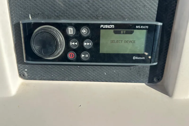 Slide: The Image of Fusion MS-RA70 Bluetooth stereo on 2004 Grady-White Sportsman 180 boat dashboard. - 25