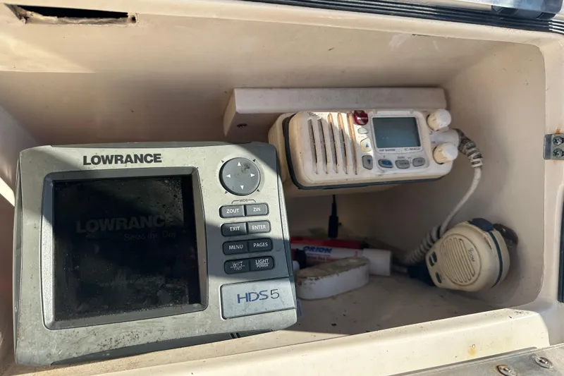 Slide: The Image of Lowrance marine electronics in a 2004 Grady-White Sportsman 180 boat console. - 26