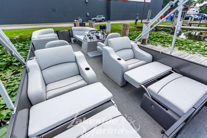 Slide: The Image of 2021 Crest Classic LX 220 SLRC pontoon boat with luxurious seating and modern design. - 32