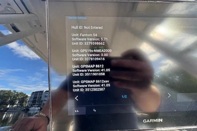Slide: The Image of Garmin device display on 2022 Edgewater 280CC boat, showing software versions and unit IDs. - 27