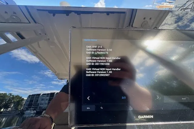 Slide: The Image of Garmin display on 2022 Edgewater 280CC boat showing software details and unit IDs. - 28
