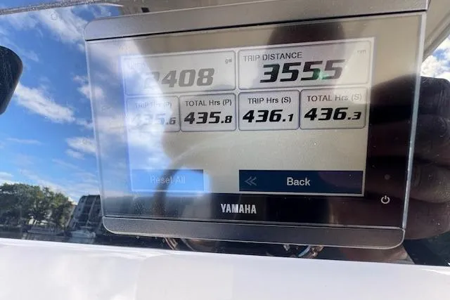 Slide: The Image of Yamaha display showing trip data on 2022 Edgewater 280CC boat. - 34
