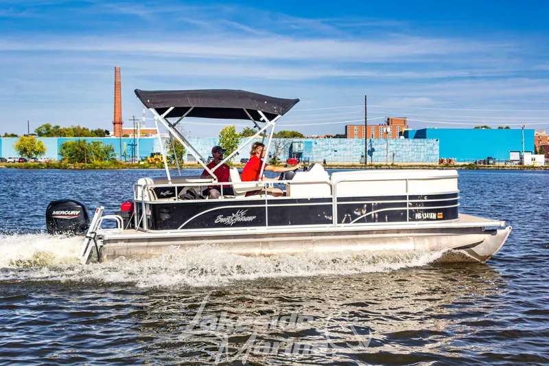 The Image of 2021 SunChaser Geneva Cruise 20 CRS pontoon boat cruising on a sunny day. - 1