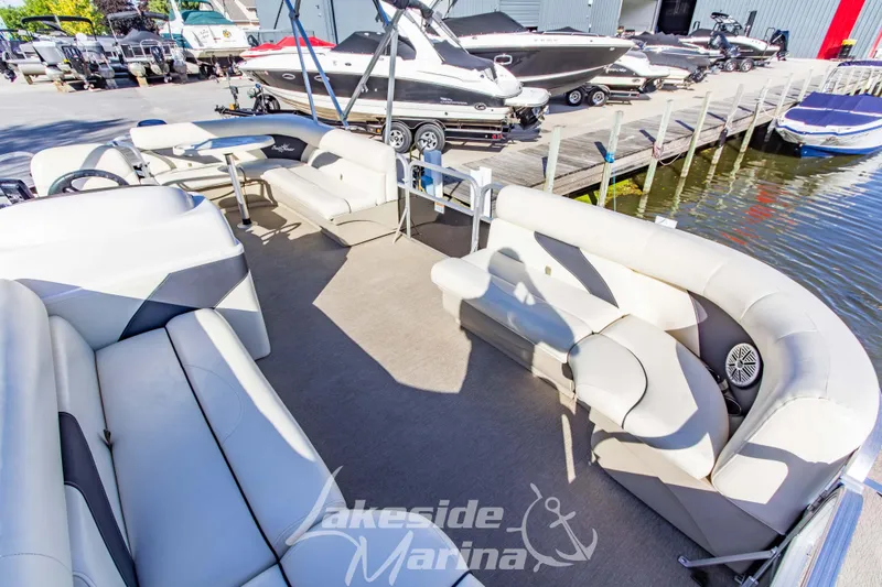 Slide: The Image of 2021 SunChaser Geneva Cruise 20 CRS pontoon boat with spacious seating at Lakeside Marina. - 10