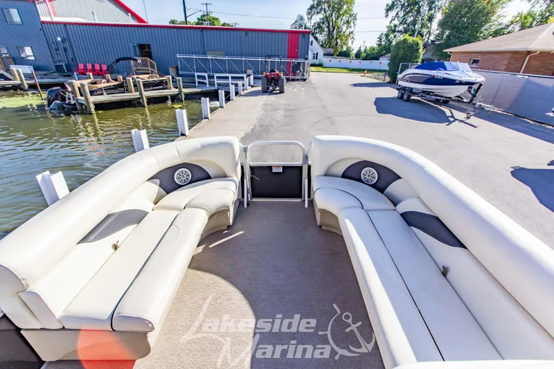 Slide: The Image of 2021 SunChaser Geneva Cruise 20 CRS pontoon boat at marina dockside. - 12