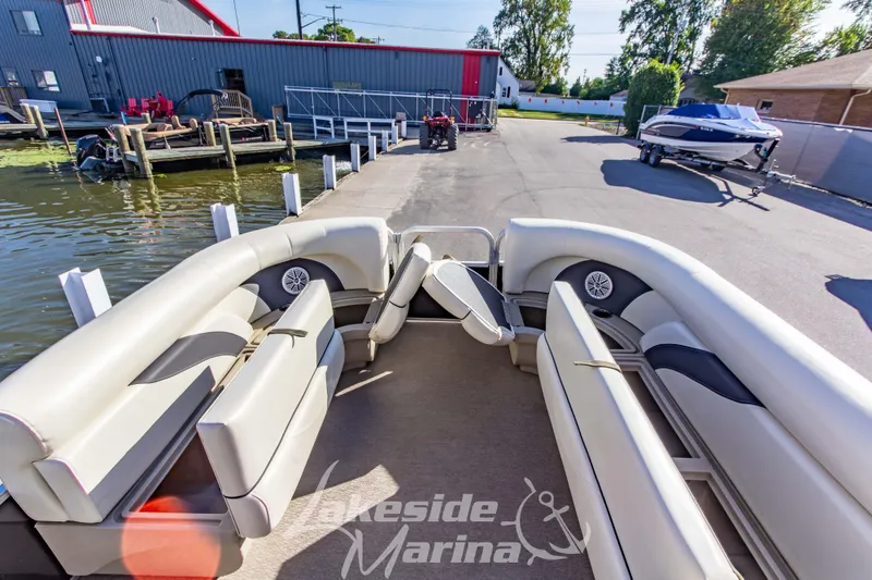 Slide: The Image of 2021 SunChaser Geneva Cruise 20 CRS pontoon boat at marina dockside. - 13