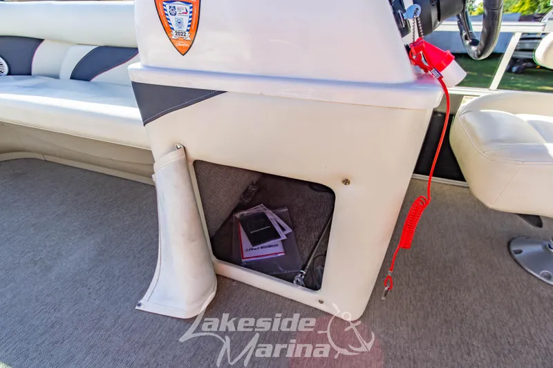 Slide: The Image of 2021 SunChaser Geneva Cruise 20 CRS interior with storage compartment and seating. - 15