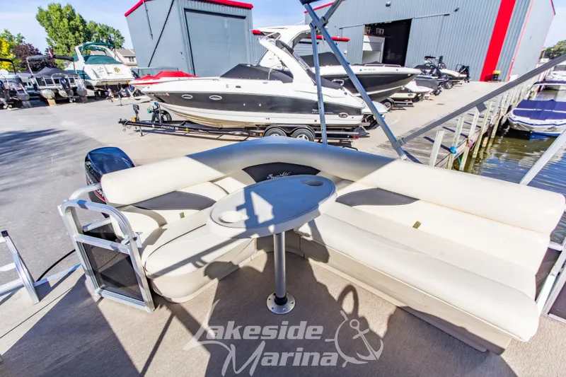 Slide: The Image of 2021 SunChaser Geneva Cruise 20 CRS pontoon boat at Lakeside Marina dock. - 19