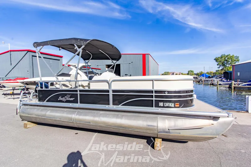 Slide: The Image of 2021 SunChaser Geneva Cruise 20 CRS pontoon boat at Lakeside Marina, dockside view. - 3