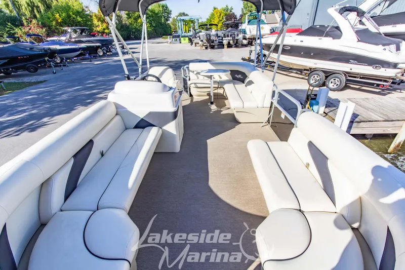 Slide: The Image of 2021 SunChaser Geneva Cruise 20 CRS pontoon boat with spacious seating at Lakeside Marina. - 9