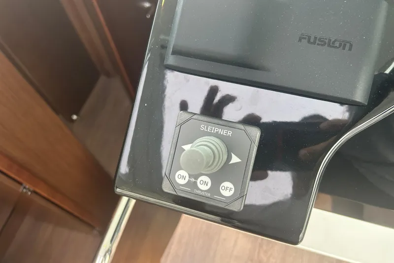 Slide: The Image of Dashboard of 2025 Beneteau Antares 11 Coupe with Garmin display and Mercury controls. - 25