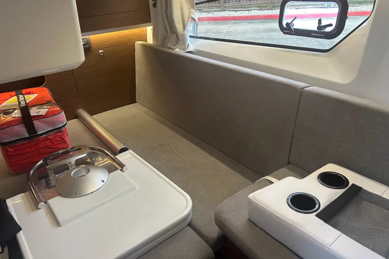 Slide: The Image of Garmin display on 2025 Beneteau Antares 11 Coupe dashboard with Mercury controls. - 29