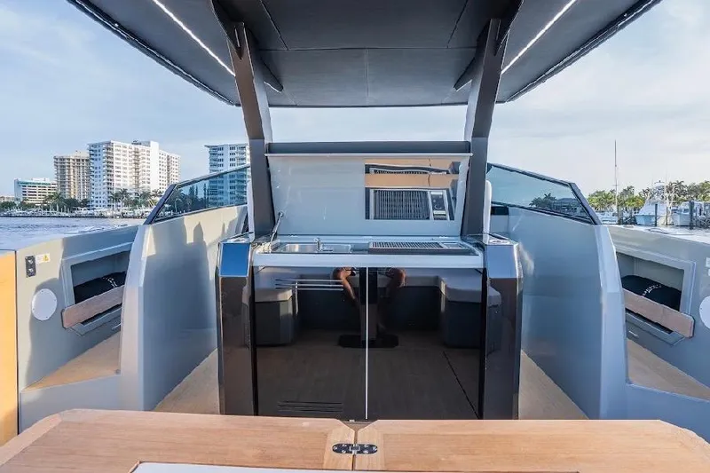 Slide: The Image of 2024 Rio Yachts Daytona 50 luxury yacht interior with modern kitchen and sleek design. - 20