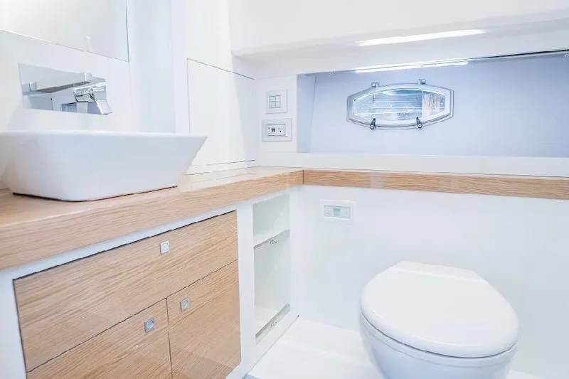 Slide: The Image of Luxurious bathroom in 2024 Rio Yachts Daytona 50, featuring modern fixtures and elegant design. - 31