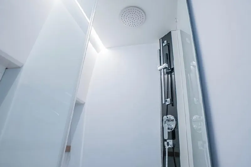 Slide: The Image of Modern shower in 2024 Rio Yachts Daytona 50, featuring sleek design and chrome fixtures. - 33
