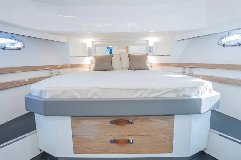 Slide: The Image of Luxurious cabin interior of 2024 Rio Yachts Daytona 50 with modern design and cozy bedding. - 34