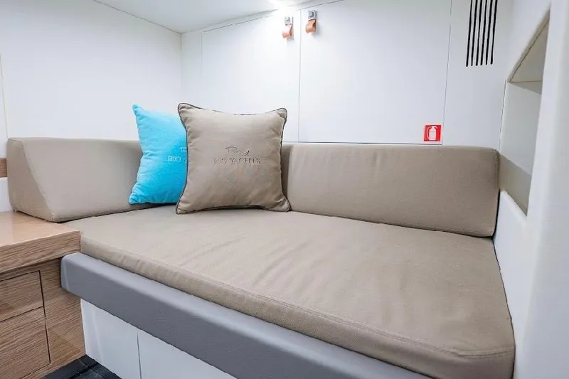Slide: The Image of Luxurious interior of 2024 Rio Yachts Daytona 50 with comfortable seating and cushions. - 35