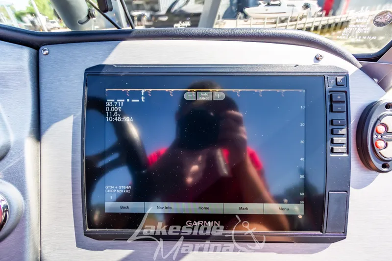 Slide: The Image of Garmin display on 2020 Triton 216 Fishunter boat dashboard at Lakeside Marina. - 16