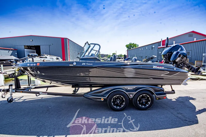 Slide: The Image of 2020 Triton 216 Fishunter boat on trailer at Lakeside Marina. - 3