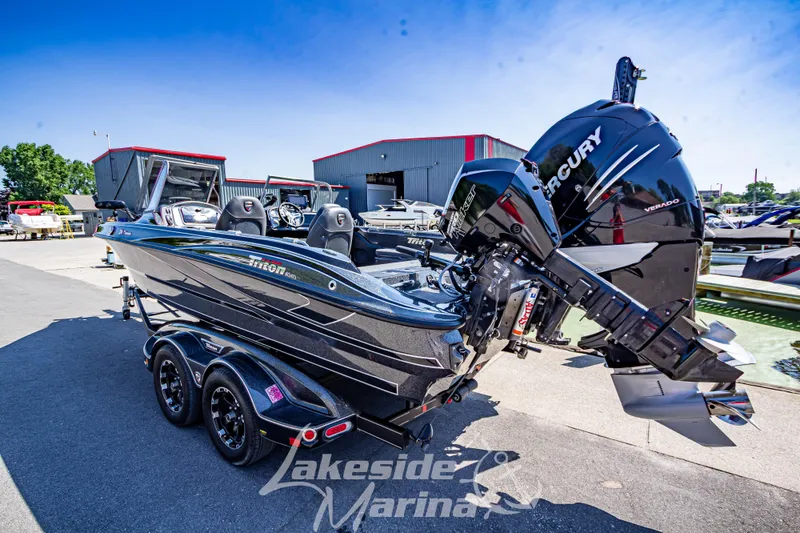 Slide: The Image of 2020 Triton 216 Fishunter boat with Mercury engine at Lakeside Marina. - 4