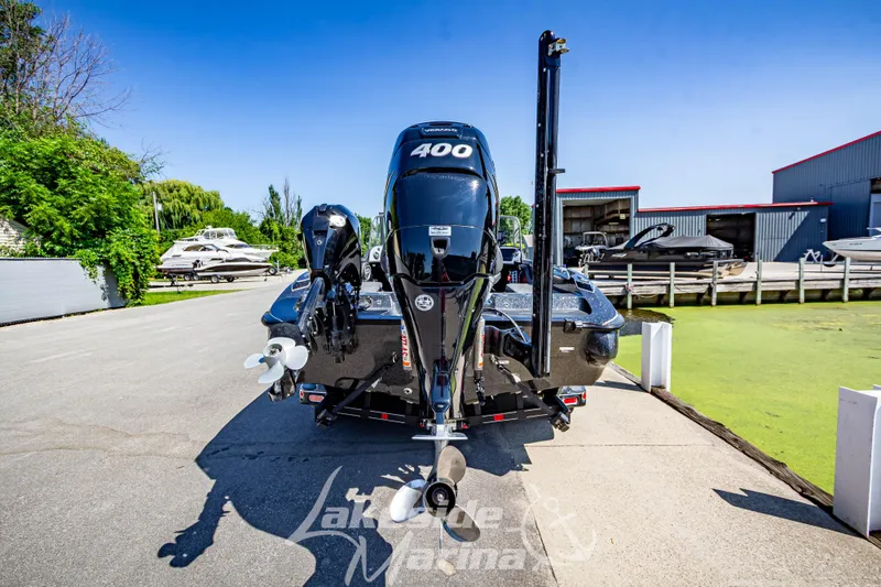 Slide: The Image of 2020 Triton 216 Fishunter boat with powerful engine at marina dock. - 5
