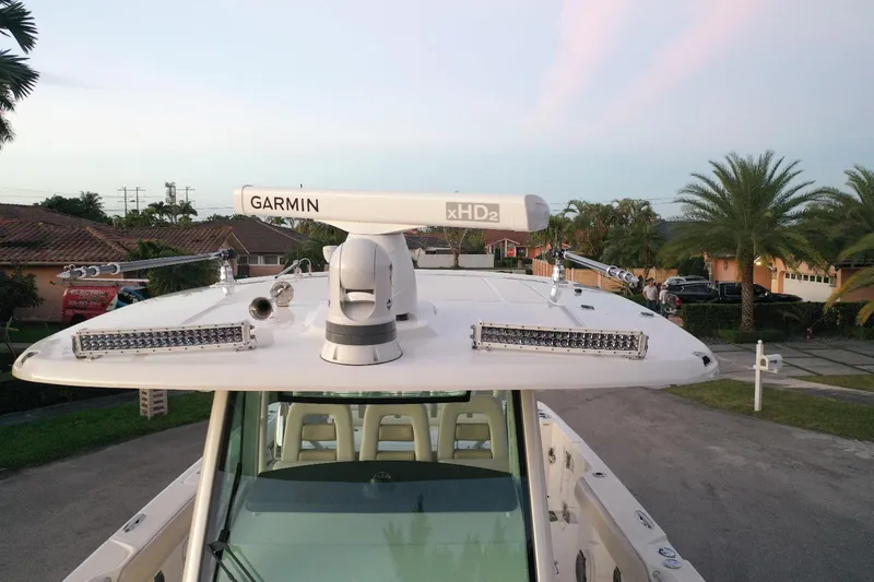 Slide: The Image of 2021 Boston Whaler 350 Outrage with Garmin radar and HD2 technology. - 20