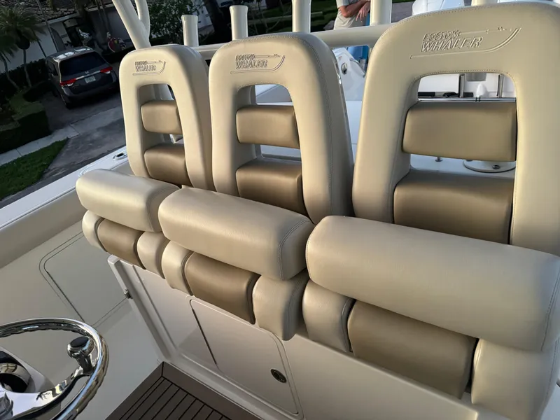 Slide: The Image of Boston Whaler 350 Outrage 2021 model with luxurious seating arrangement. - 41