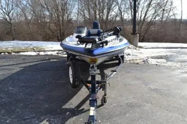Slide: The Image of 2008 Nitro 640 boat on trailer in snowy outdoor setting. - 5