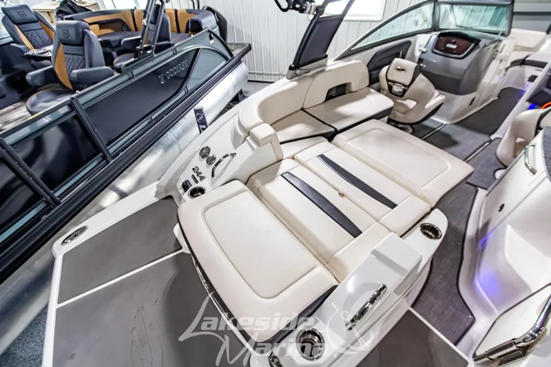 Slide: The Image of 2017 Chaparral 244 Sunesta boat interior with luxurious seating and modern design. - 12