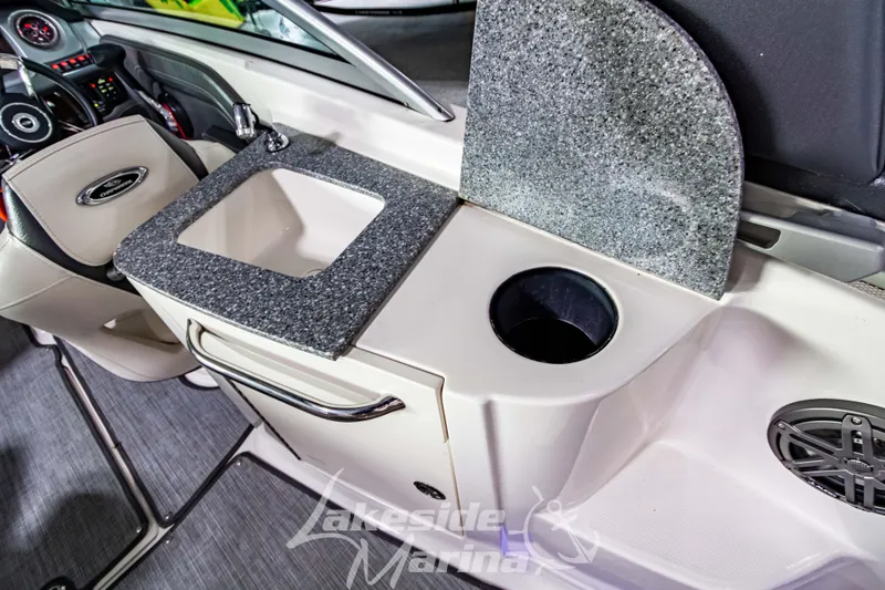 Slide: The Image of 2017 Chaparral 244 Sunesta boat interior with sink and countertop. - 17