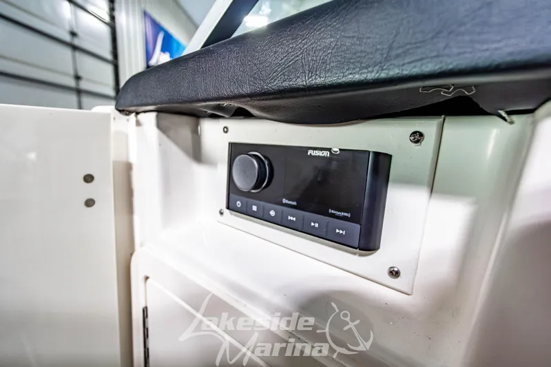 Slide: The Image of 2017 Chaparral 244 Sunesta boat interior with Fusion audio system. - 32