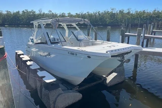 The Image of 2024 World Cat 280 DC-X boat docked on a sunny day. - 1