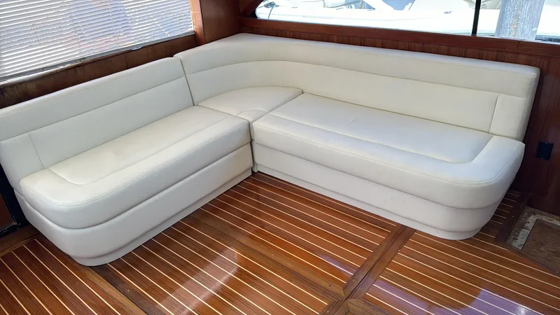 Slide: The Image of Luxurious white leather seating on 1997 Ocean Yachts 40 Super Sport. - 16