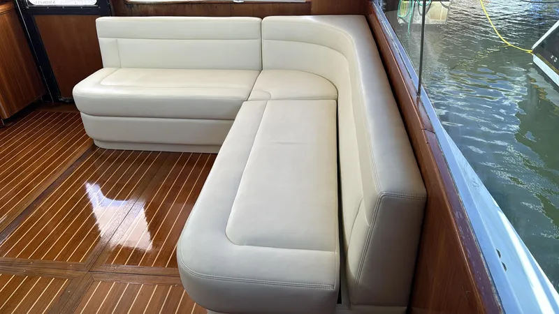 Slide: The Image of Luxurious interior seating of a 1997 Ocean Yachts 40 Super Sport boat. - 18